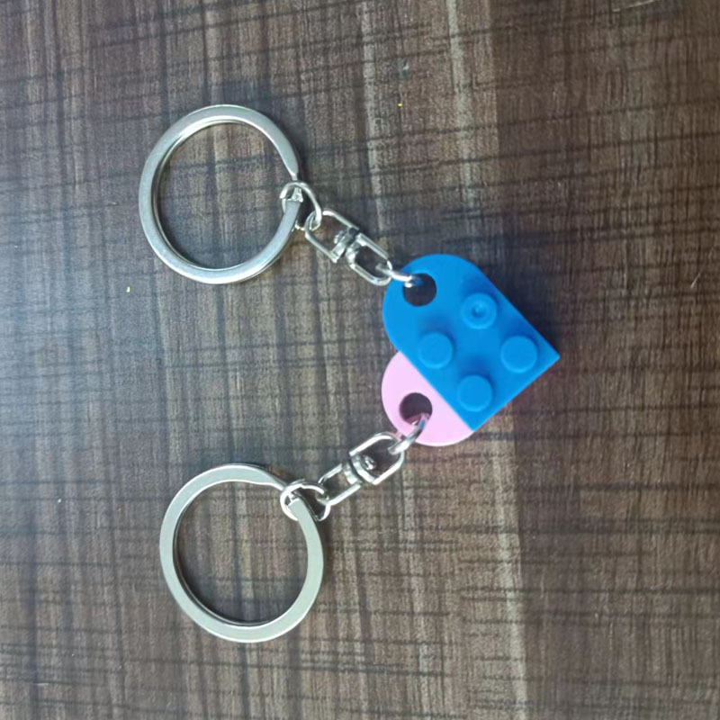 Europa y América Nueva spliced dividir bloques de construcción pareja amor llavero Comercio electrónico transfronterizo Lego rompecabezas llavero