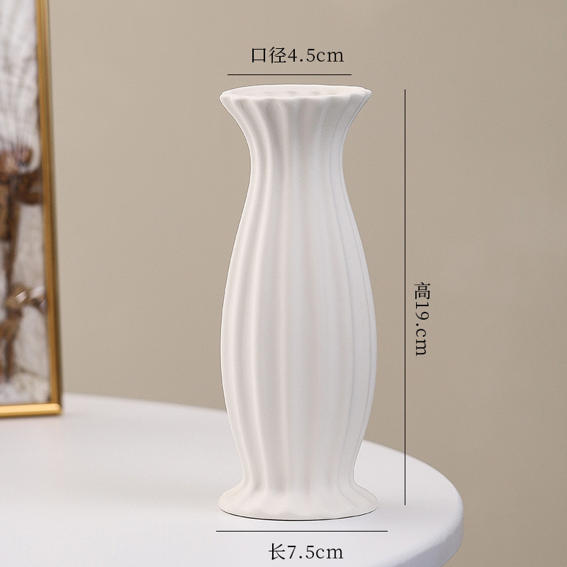 シンプルな現代の満天星陶磁器の花瓶の置物の客間の白い磁器の小さい清新な乾いた花の生け花の創意の陶磁器の花器|undefined