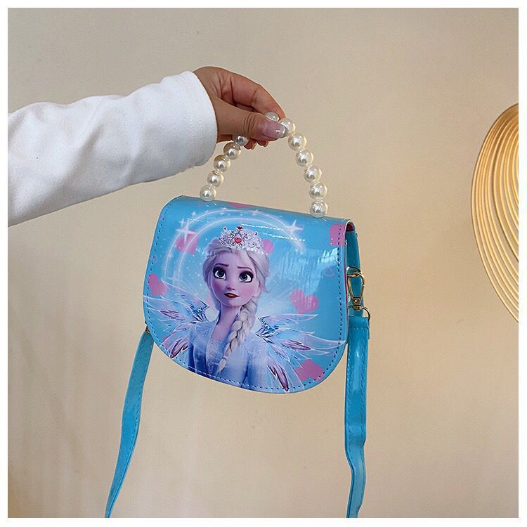 2024 nueva bolsa de hombro para niños princesa Elsa dibujos animados Yue Gui perro coreano nicho perla bolsa de mano inclinada