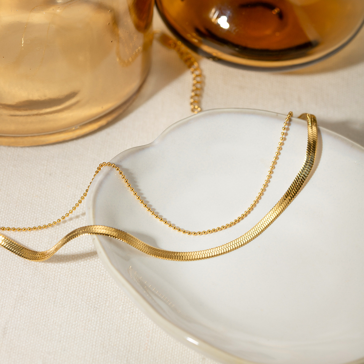 Europa y los Estados Unidos transfronterizos INS viento femenino 18 quilates oro pulido cuchilla cadena cadena de serpiente cadena de perlas Xiaomi doble tobilla joyería al por mayor