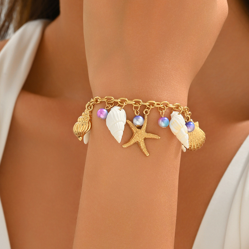 European and American Cross-Border Starfish, Conch, Pearl, and Shell Pendant Bracelet, Fashionable Beach Style Marine Life Upper Arm Bracelet European and American Cross-Border Starfish, Conch, Pearl, and Shell Pendant Bracelet, Fashionable Beach Style Marine Life Upper Arm Bracelet