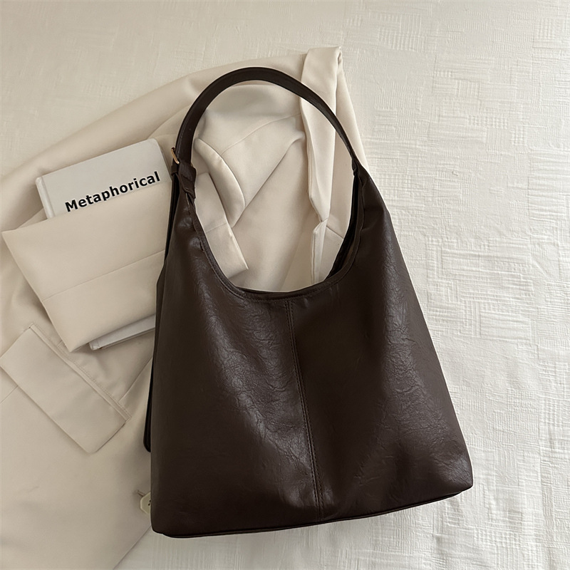 Nuevo estilo coreano de color sólido invierno retro traslado bajo la axila de gran capacidad 2024 moda de un hombro mochila de moda