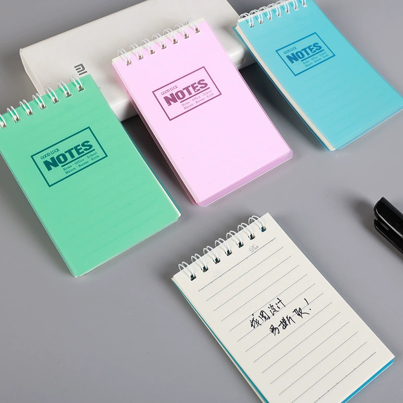 A7 spiral pocket notebook, handheld for elementary students, mixed pastel covers, wholesale 100‑pack