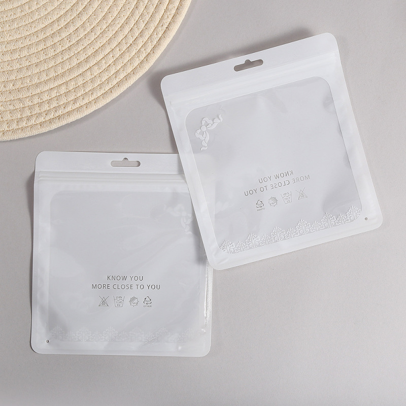 PEプラスチック製の自封袋、厚手の透明な靴下用汎用包装袋、キリンの漫画柄衣類袋、越境向け|undefined
