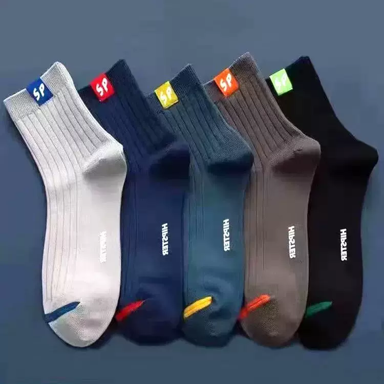 SP袜子男士中筒秋冬季新款黑色长筒商务纯色春秋男袜子源头批发厂