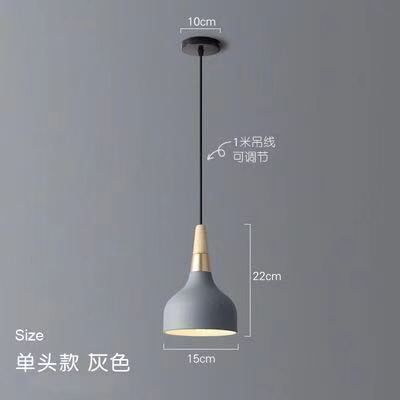 Candelabro de una sola cabeza Zhongshan, sensación avanzada, mesa de comedor de estilo cremoso creativo nórdico, lámpara de mesita de noche, araña de arte minimalista moderno