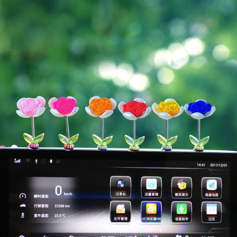 Tendencia nuevo producto flocado rosa coche sacudiendo la cabeza pequeños adornos decoración de primavera tablero accesorios de coche ventana