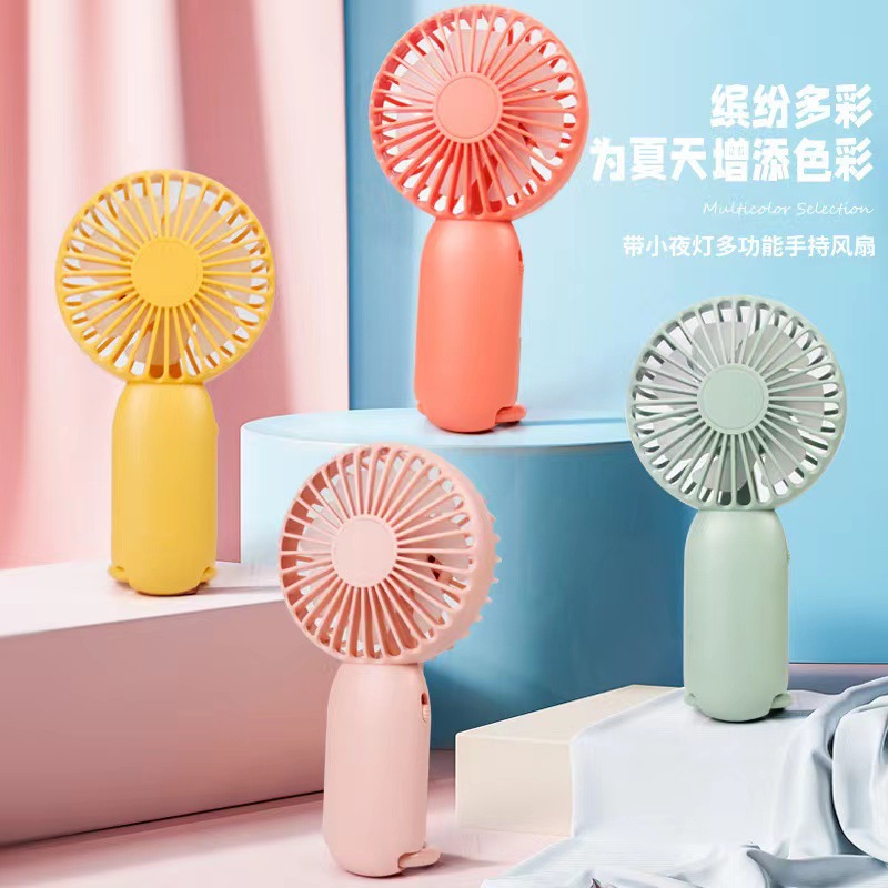 Cartoon travel handheld air fan for students for traveling with…