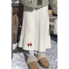 蝴蝶结针织半身裙女秋冬款长款a字白色长裙2025新款半裙