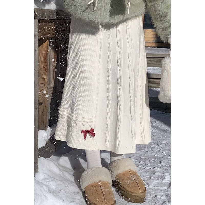 蝴蝶结针织半身裙女秋冬款长款a字白色长裙2025新款半裙