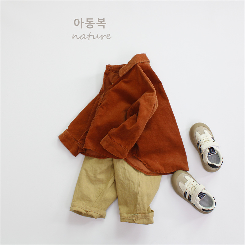 Camisas infantiles de primavera 2025, categoría A, camisas para niños estilo coreano, versátiles, con cuello vuelto, de pana, blusas para niñas, al por mayor.