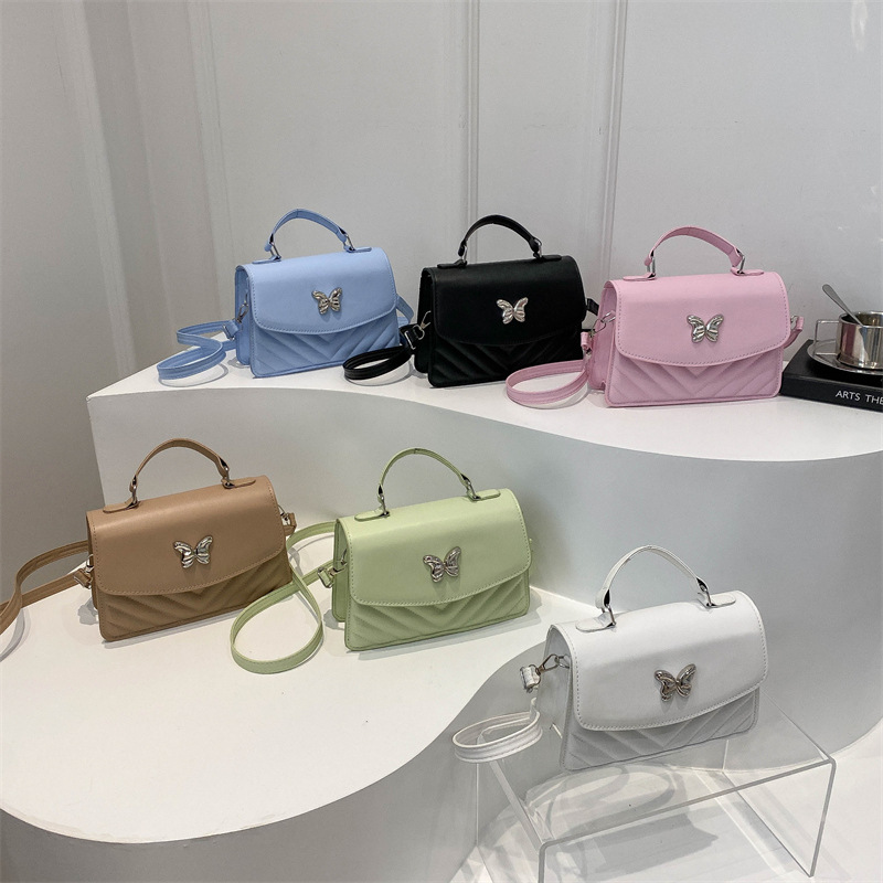 Bolso de moda simple, nuevo bolso de mujer coreano, bolso de hombro de color sólido, nicho universal, bolso de mano, bolso cuadrado para mujeres transfronterizas