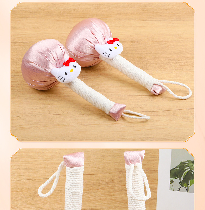 Cute Cat Cartoon Satin Moxa Hammer Handheld Back Massage Tool 26cm in use