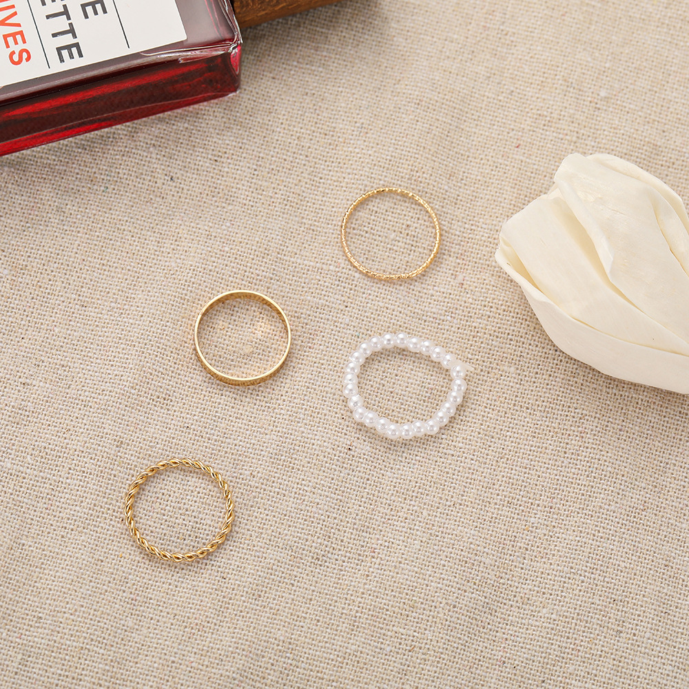 Fashion Simple Pearl Wave Twist Joint Alloy Ring Four-piece Set display picture 2