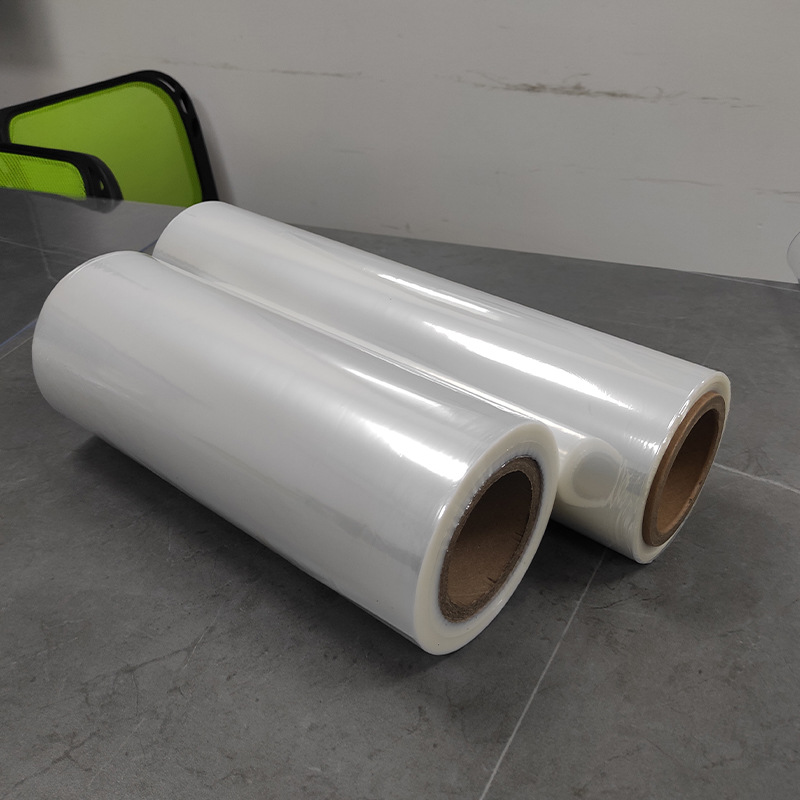 Fábrica al por mayor POF película retráctil película criogénica transparente reticulada película plegable cosmética embalaje Termocontraíble película de sellado de plástico