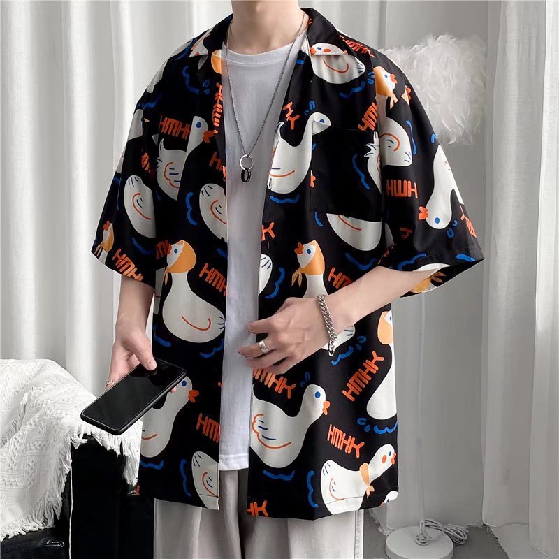 Hong Kong estilo Retro Vintage floral camisa de manga corta Estilo Hawaiano tailandés diseño sentido Ruan guapo camisa suelta para hombres y mujeres