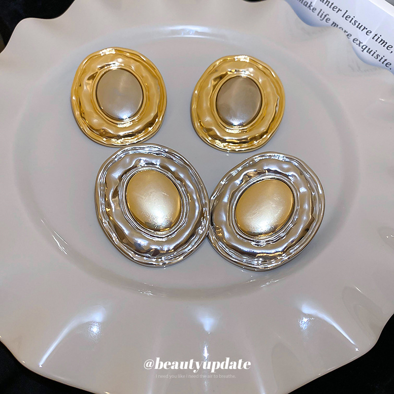 Pendientes elípticos exagerados transfronterizos de metal con aguja de plata Pendientes de moda de nicho europeo y americano Pendientes de lujo ligero simples y de alta gama mujeres