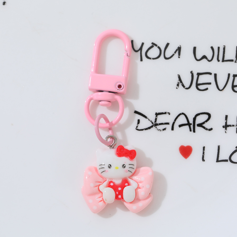 Cartoon Moon Cat DIY accesorios de resina llaveros Sanrio arco gato bolsas colgantes de chicas