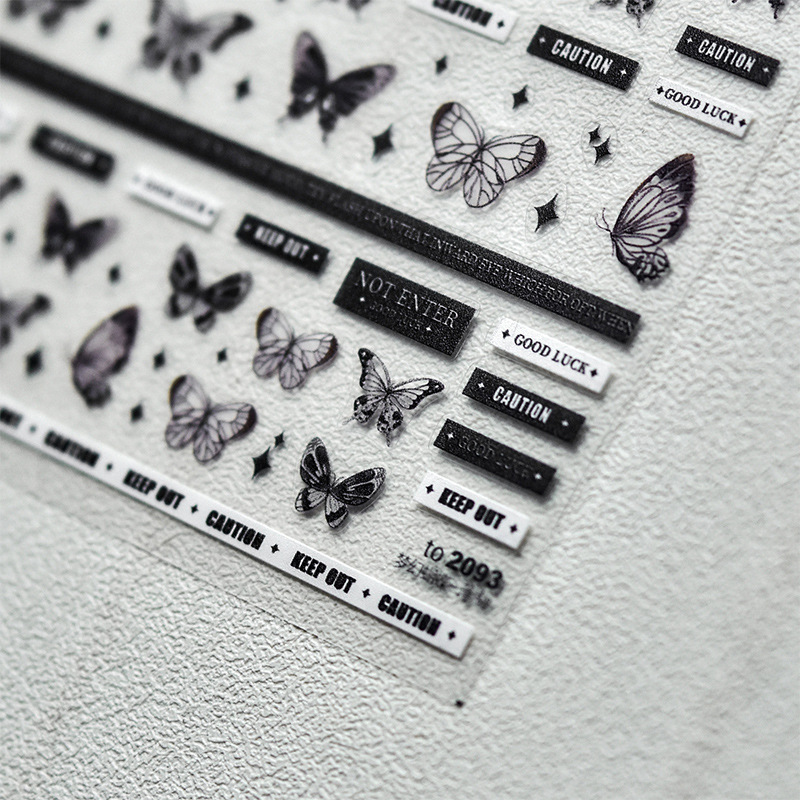 Tomoni en línea estilo de celebridad pegatinas de uñas cinta estilo de Chanel alivio mariposa letras inglesas estilo oscuro textura de uñas