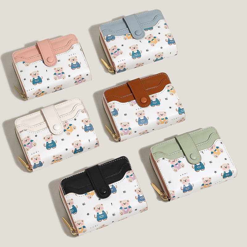 Nuevo tipo de billetera de mujer encantadora impresión de dinosaurio botón corto anti-damagnetismo multi-tarjeta de gran capacidad cartera de alto nivel