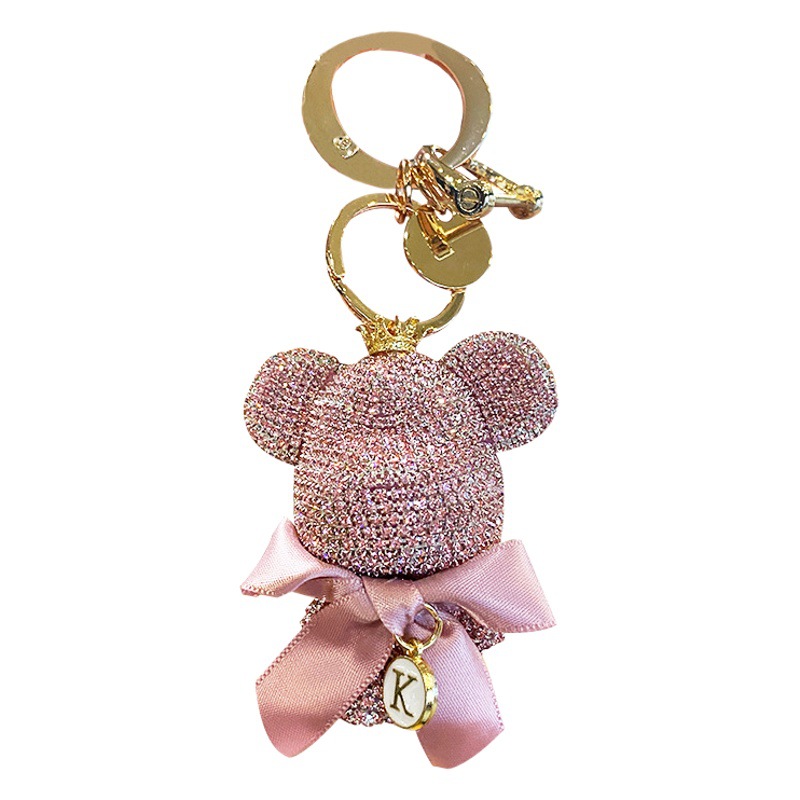 Diamante de gama alta oso anti-perdido coche llavero exquisito lindo hombres y mujeres llavero de dibujos animados muñeca regalo al por mayor