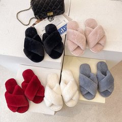 2025秋冬の女性のファッションの交差帯の開口部の純色のシンプルなぬいぐるみの家庭用綿のスリッパのクロスボーダー