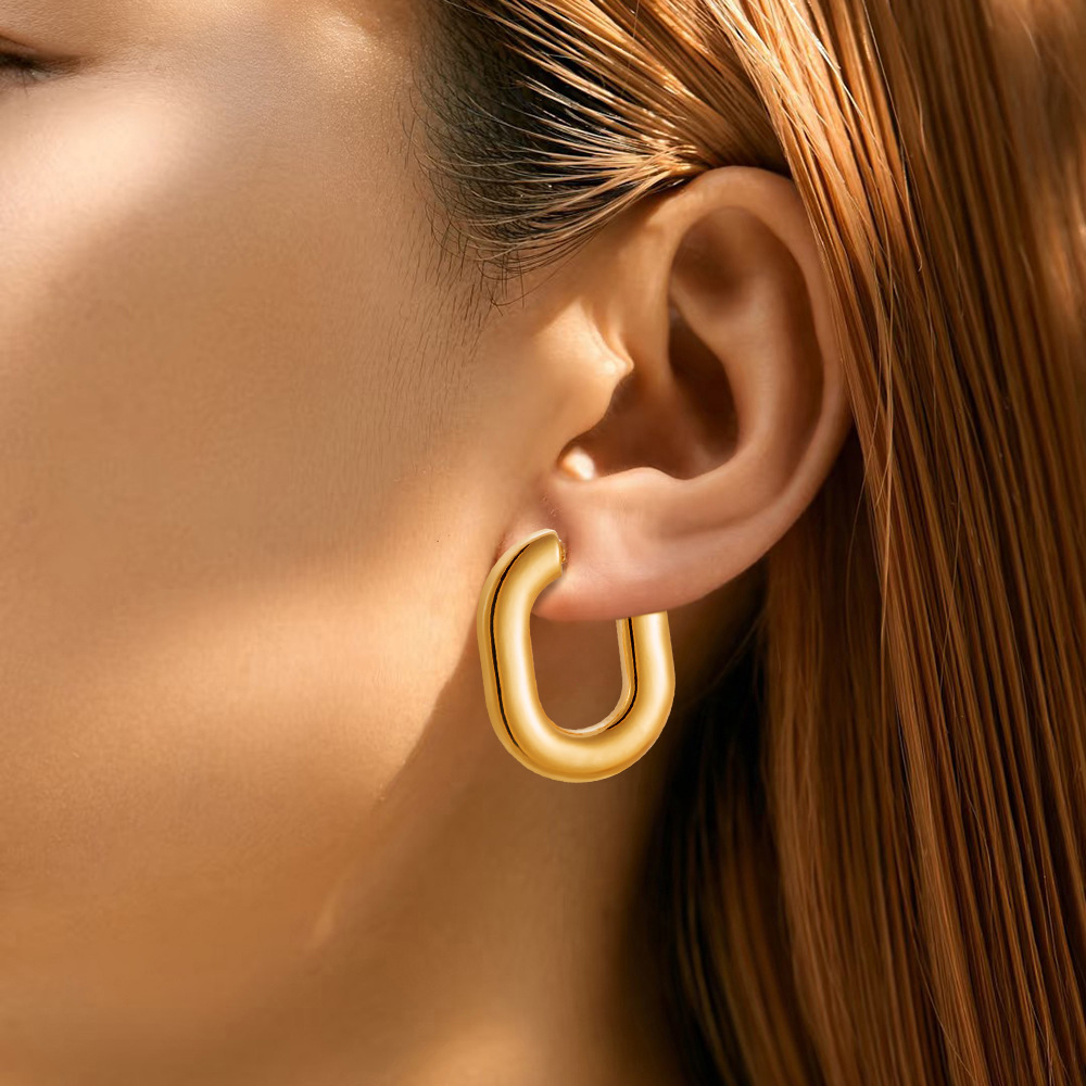 Pendientes redondos de 18K de acero inoxidable transfronterizos europeos y americanos exagerados, botones de oreja para mujer, nuevos pendientes retro geométricas de todo fósforo