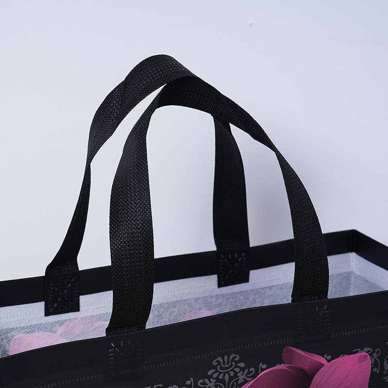 Embalaje de ropa roja bolsas de compras clásicas bolsas de mano no tejidas estereoscópicas de moda impresión en color de película - rosa negra