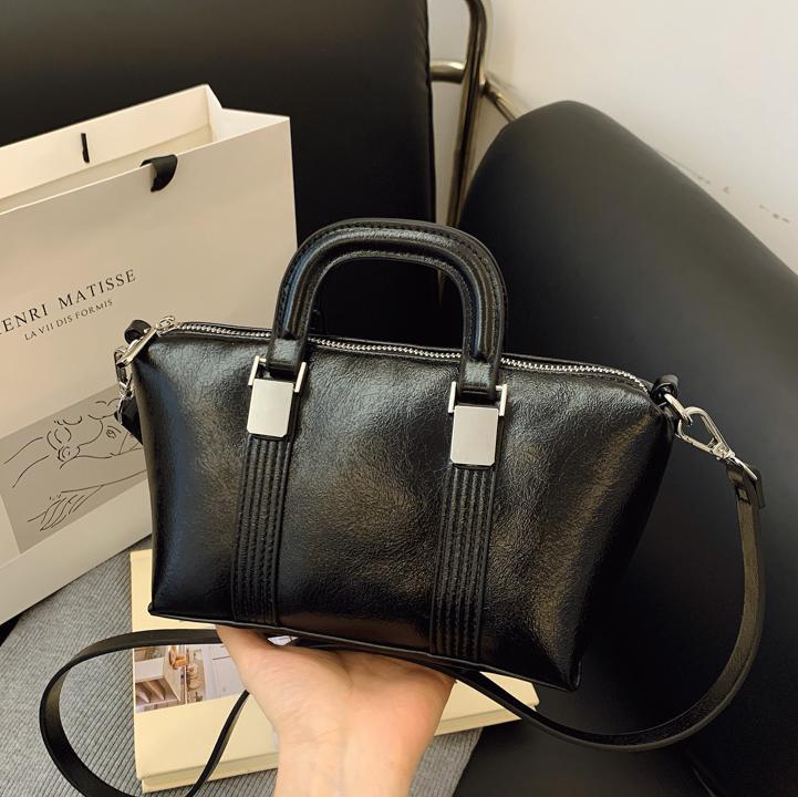 Nicho Zhong bolso de mano de diseño de alto nivel para mujeres 2025 nuevo bolso de hombro casual universal simple moda mochila