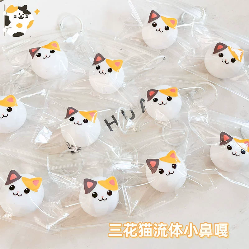 Распакуемый мини-трехцветочный кот сжимает музыку медленно, декомпрессионный шарик жидкости может сформировать маленький нос и подвешивать котенка