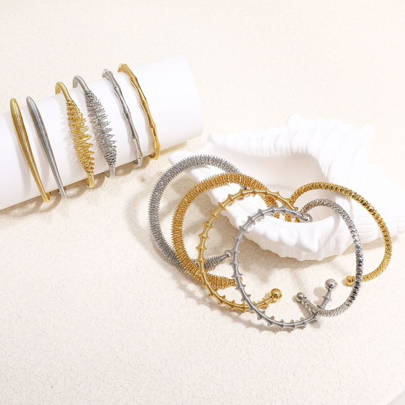 クロスボーダー竹チタン鋼ブレスレットヨーロッパとアメリカの幾何学的なスプリングブレスレット真空メッキ 18K シンプルで軽い高級ハイエンドハンドジュエリー|undefined