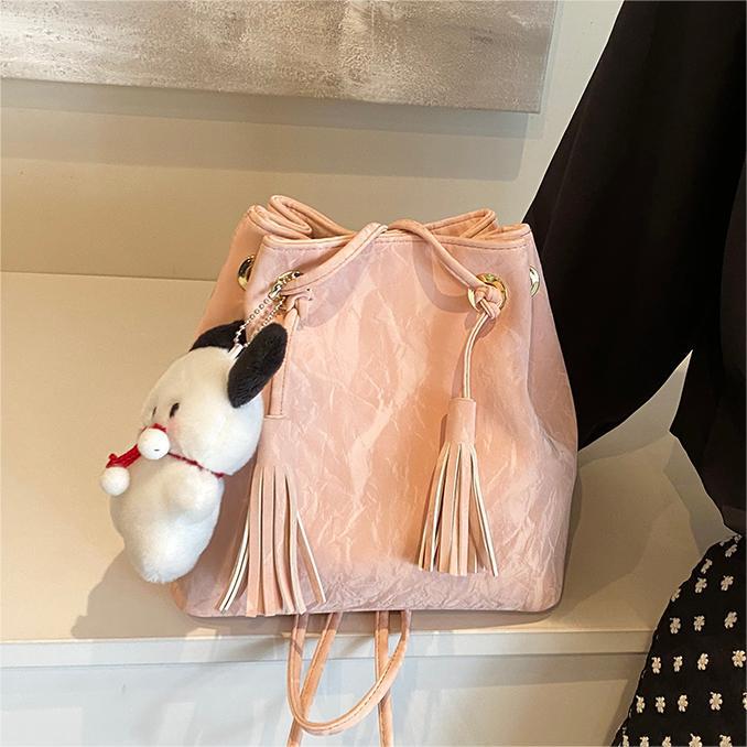 Diseño de nicho de bolsos de tendencia universal mujeres 2024 primavera y verano nuevo simple bolso de hombro de alta calidad bolso de cubo casual