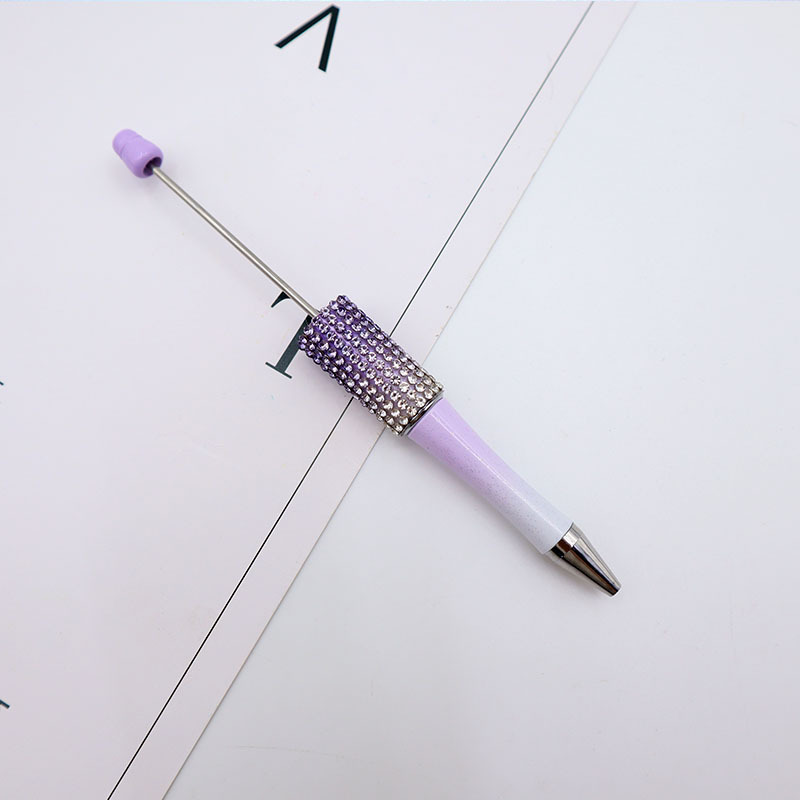 Bolígrafo giratorio de grano lindo de color degradado de tendencia de alto valor Bolígrafo de gomas galvanizado con cuentas de diamantes de bricolaje creativo