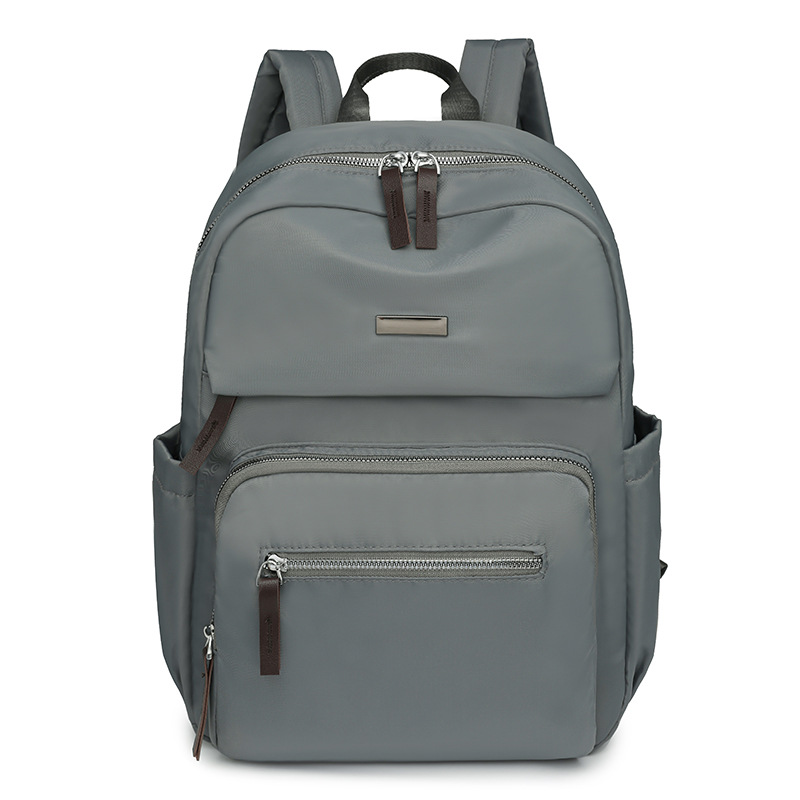 Nueva mochila casual para mujer, mochila escolar de nailon de gran capacidad para estudiantes, mochila de viaje ligera de todo fósforo al aire libre al por mayor