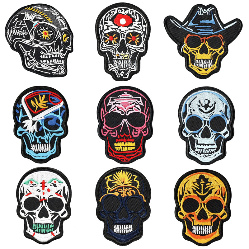 跨境专供刺绣电脑绣花骷髅头服装辅料装饰补丁布贴背面带烫胶章仔