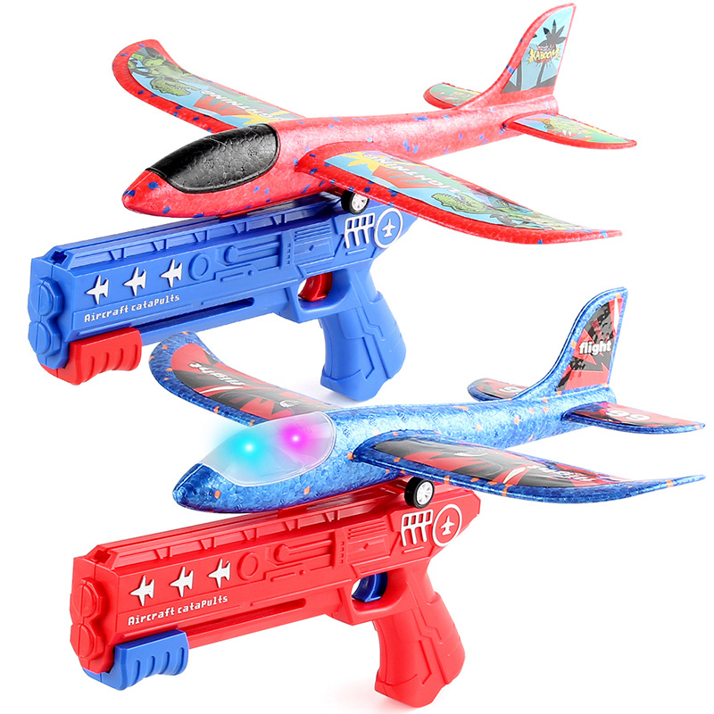 Lanzamiento de un clic espuma emisora de luz Catapulta Aeronave pistola lanzadora de mano planeador juguetes al aire libre para niños puesto de mercado nocturno Juguetes image 6