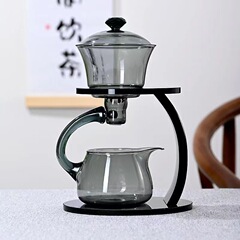 怠け者の磁気は茶器の高いホウ素のケイ素のティーポットのガラスのセットの家庭用の磁気を吸って事務室の茶器の工夫の茶器を浸します。