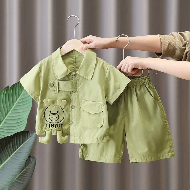 7286 traje de verano para niños 2025 nueva camisa de oso de dibujos animados para niños pantalones cortos de manga corta de verano de dos piezas de verano