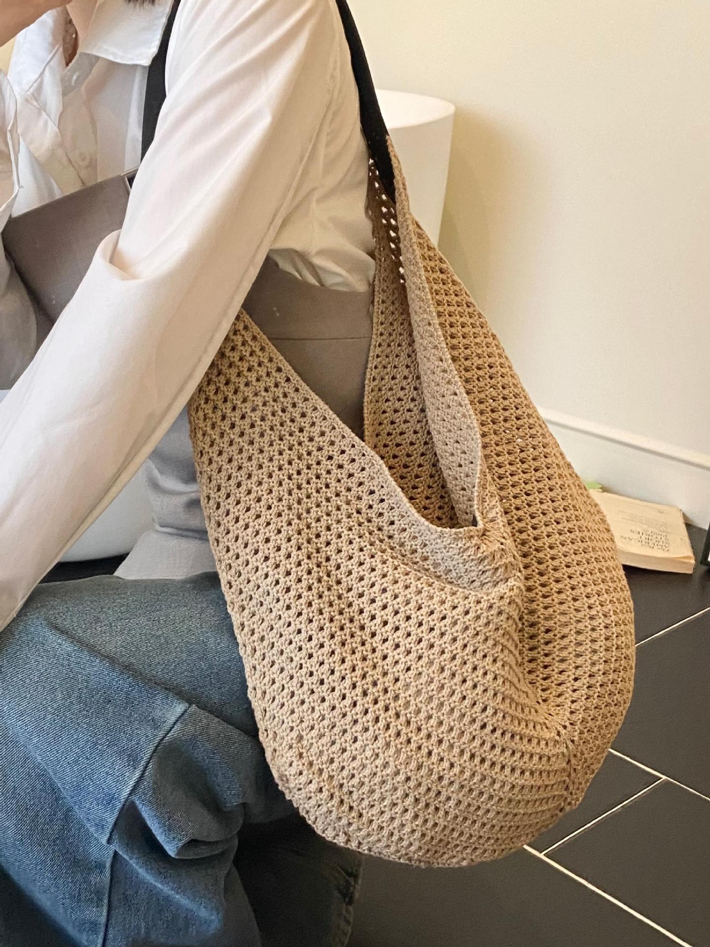 Bolso de axila de estilo explosivo de diseño hueco popular de verano 2025 nuevo bolso tejido de paja de moda bolso de playa señoras