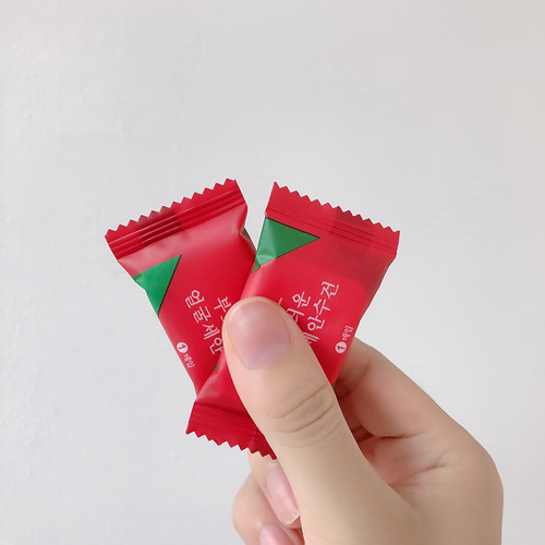 Factory direct sales compressed towel disposable thickened candy cleansing towel travel portable face washcloth wholesale