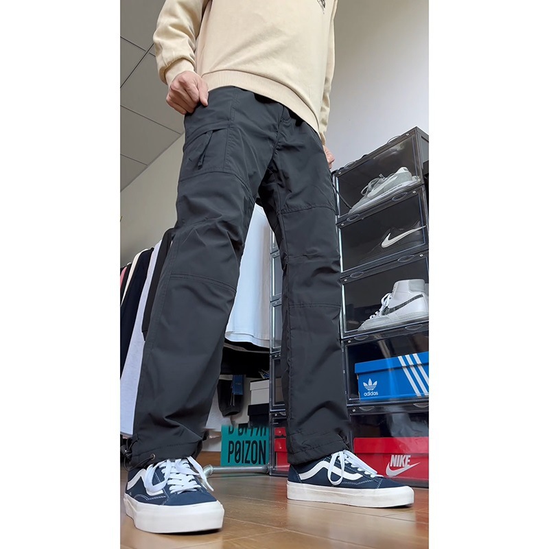 Venta al por mayor pantalones de asalto de caparazón suave estadounidense de estilo fino para hombres pantalones de secado rápido con función de tala de primavera y otoño