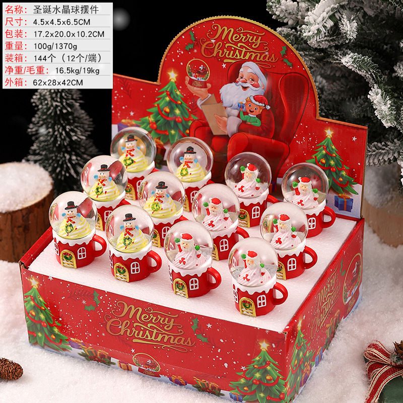 Una variedad de regalos de decoración de Navidad Navidad iluminante bola de cristal caja de música ventana diseño de velas lámparas de viento árbol de Navidad