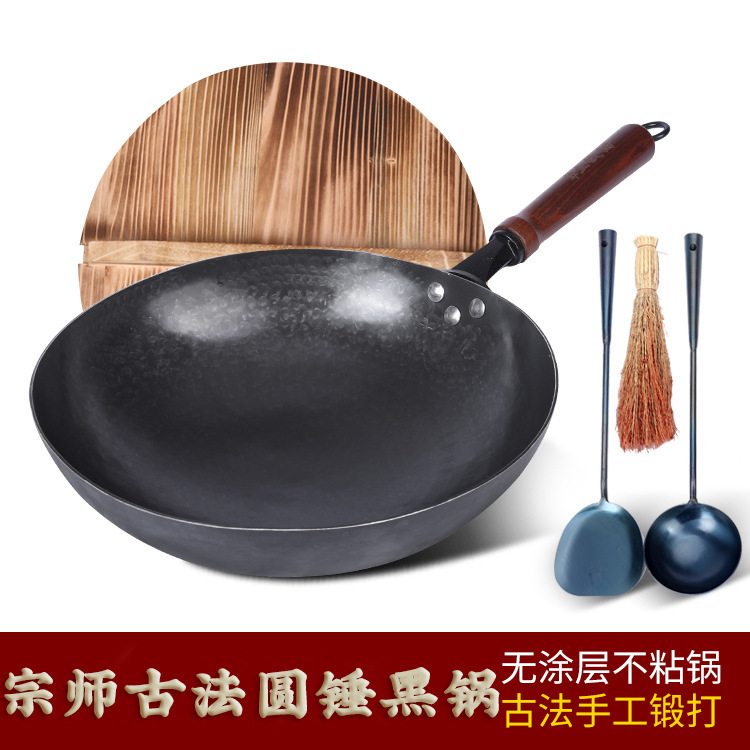 本格的な章丘手作り鍛造鉄鍋はコーティングされていない鍋の伝統的な炒め物鍋鏡面木柄の丸い炒め物鍋である|undefined
