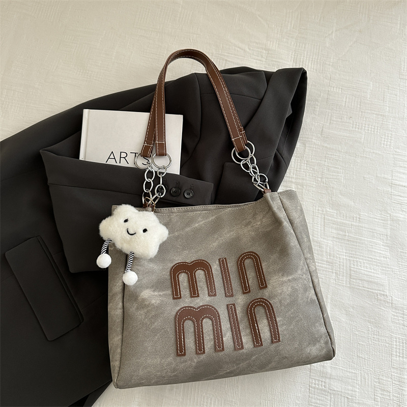 Bolso de otoño de mujer de gran capacidad de transporte 2024 nuevo bolso de hombro de moda nicho de alto nivel bolso de brazo