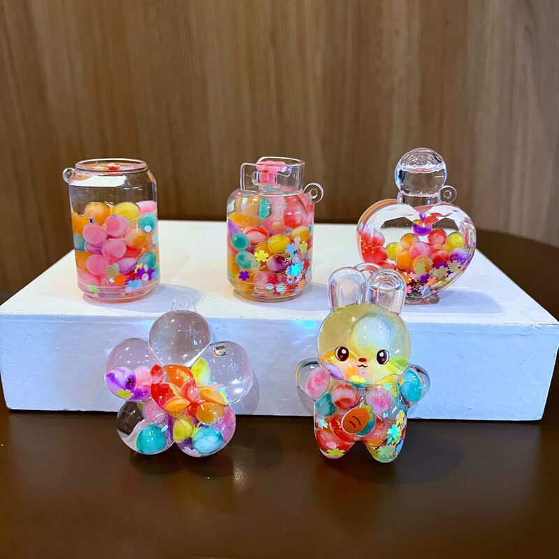 Big White Rabbit Luminous Floating Bottle Color Beads Sand Bottle Liquid Oil Key Chain Key Chain Bag Pendant Wholesale Big White Rabbit Luminous Floating Bottle Color Beads Sand Bottle Liquid Oil Key Chain Key Chain Bag Pendant Wholesale