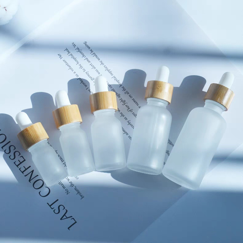 批发茶色蒙砂精油瓶避光玻璃磨砂瓶子竹木盖滴管瓶化妆品分装空瓶