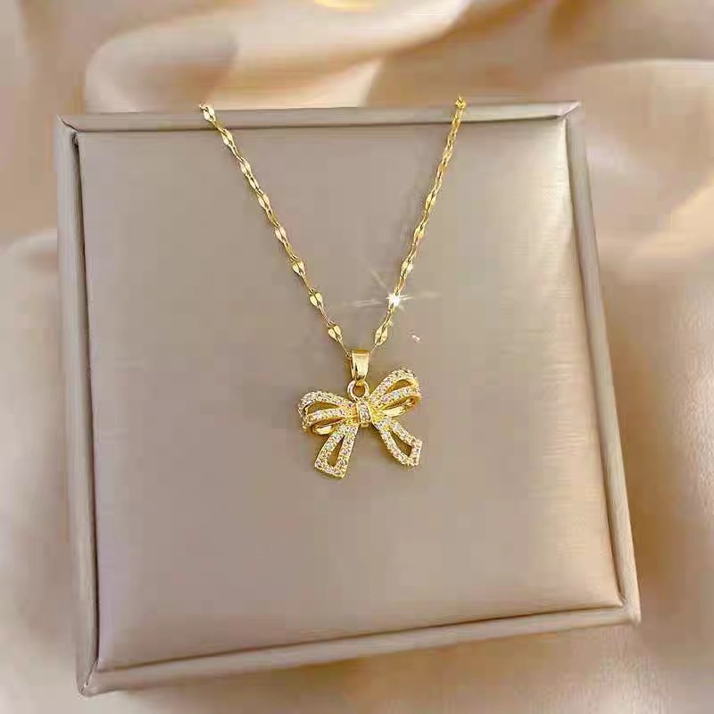 Luz de acero de titanio nicho de lujo arco collar de las mujeres de gama alta de moda todo-fósforo temperamento ZIRCON colgante Internet celebridad mismo estilo de joyería