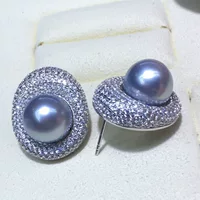 Серьги из натуральной морской воды Таити, платиново-серые, 11-12 мм, почти круглые, сильный свет, с незначительными дефектами, инкрустация стерлингового серебра