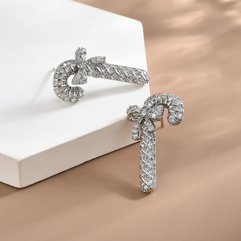 S925 Silber Nadel Japanische und Koreanische Mode Ohrringe Kupfer Micro intarsien Zirkon Fee Stick Schmetterling Knoten Ohrringe Einfache und Vielseitige Ohrringe f_voghion.com