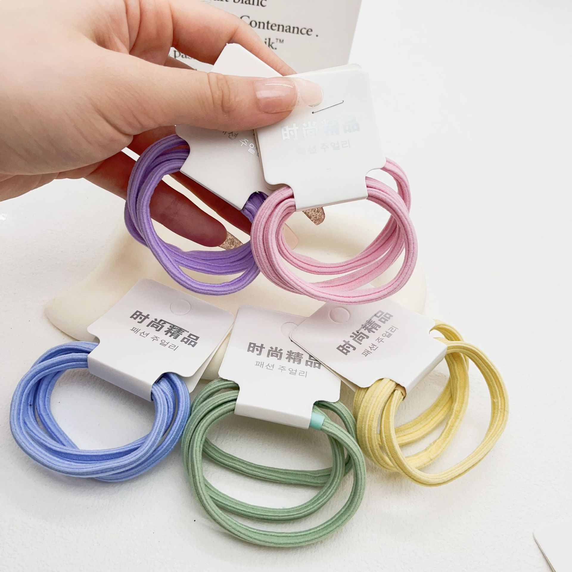 Dongdaemun estilo coreano hilo colorido accesorios para el cabello cuerda de pelo asequible banda de pelo de alta elasticidad de tres paquetes de banda de goma de dos yuanes tienda al por mayor image 19